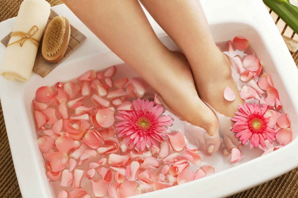 feet in a foot spa with water